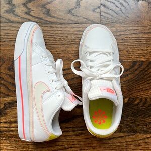 Nike White Sneakers with Pink Highlights